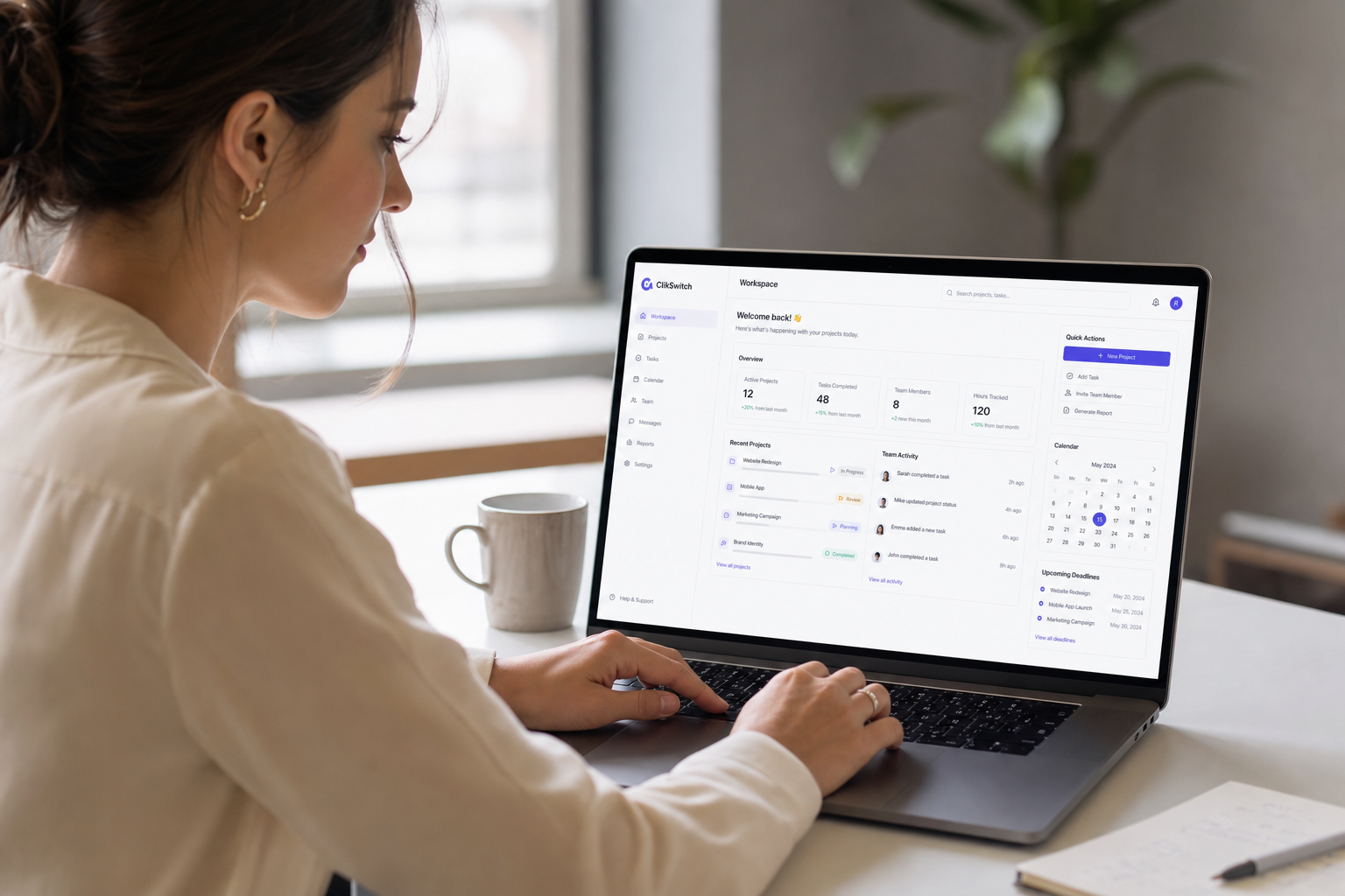 Professional using ClikSwitch workspace continuity software on a laptop